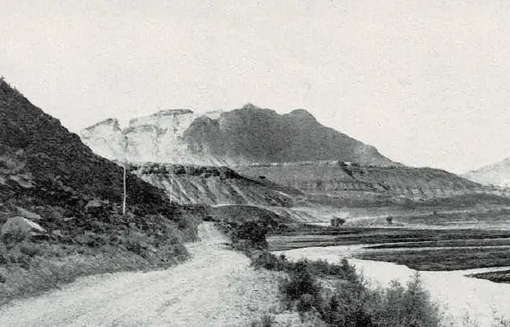 Distant view of the West Temple of the Virgin from the original brochure