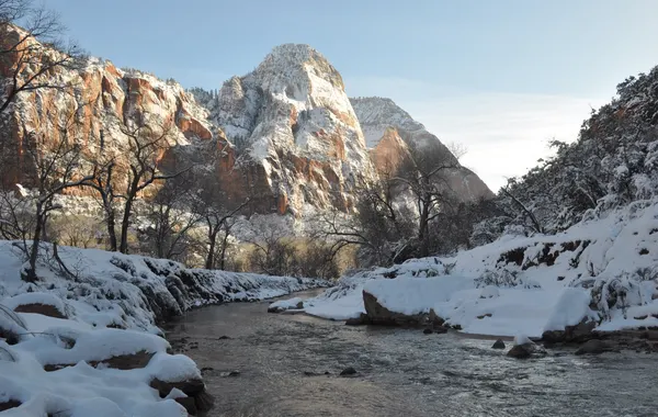 Snow along the Virgin River and canyon peaks near the Pa'Rus Trail in winter